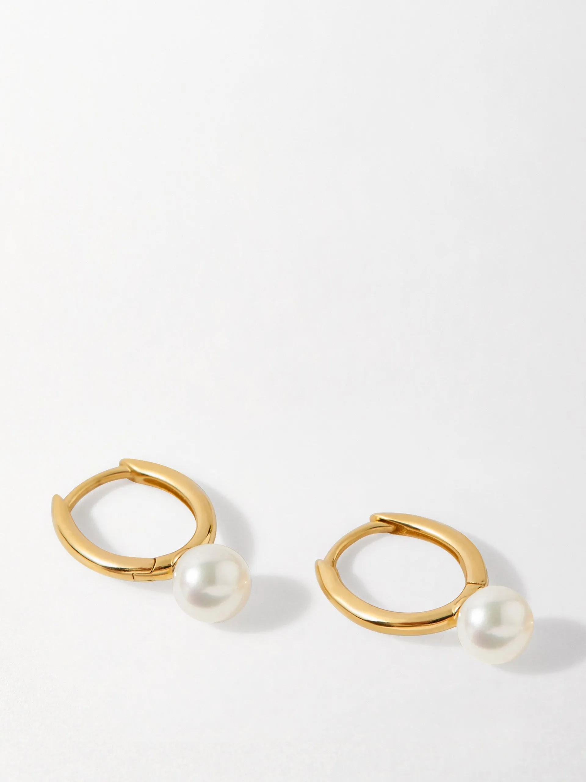 Pearl oval hoop earrings