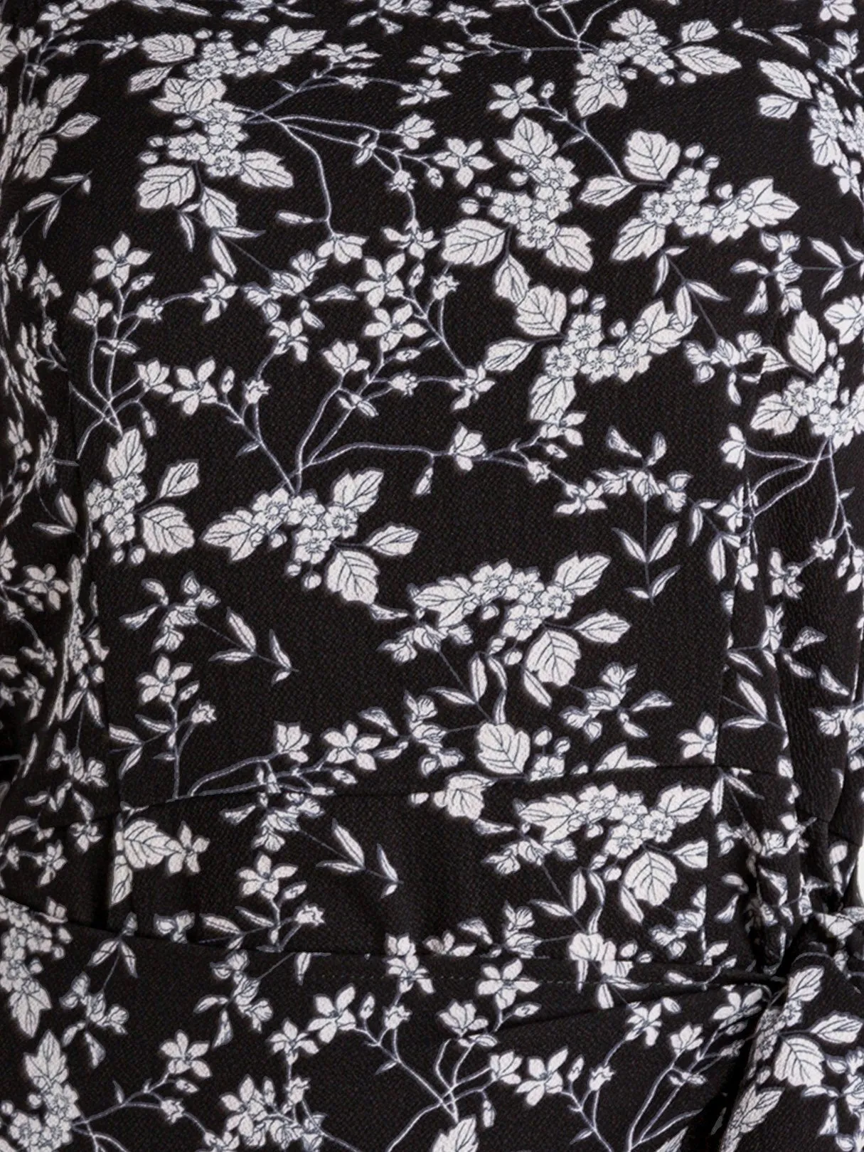 Wholesale Black Square Neck Sleeveless Floral Print Backless Ruffle Hem Mini Dresses